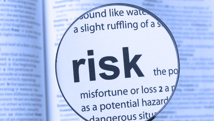 Risk management concept with word cloud showing various risk-related terms